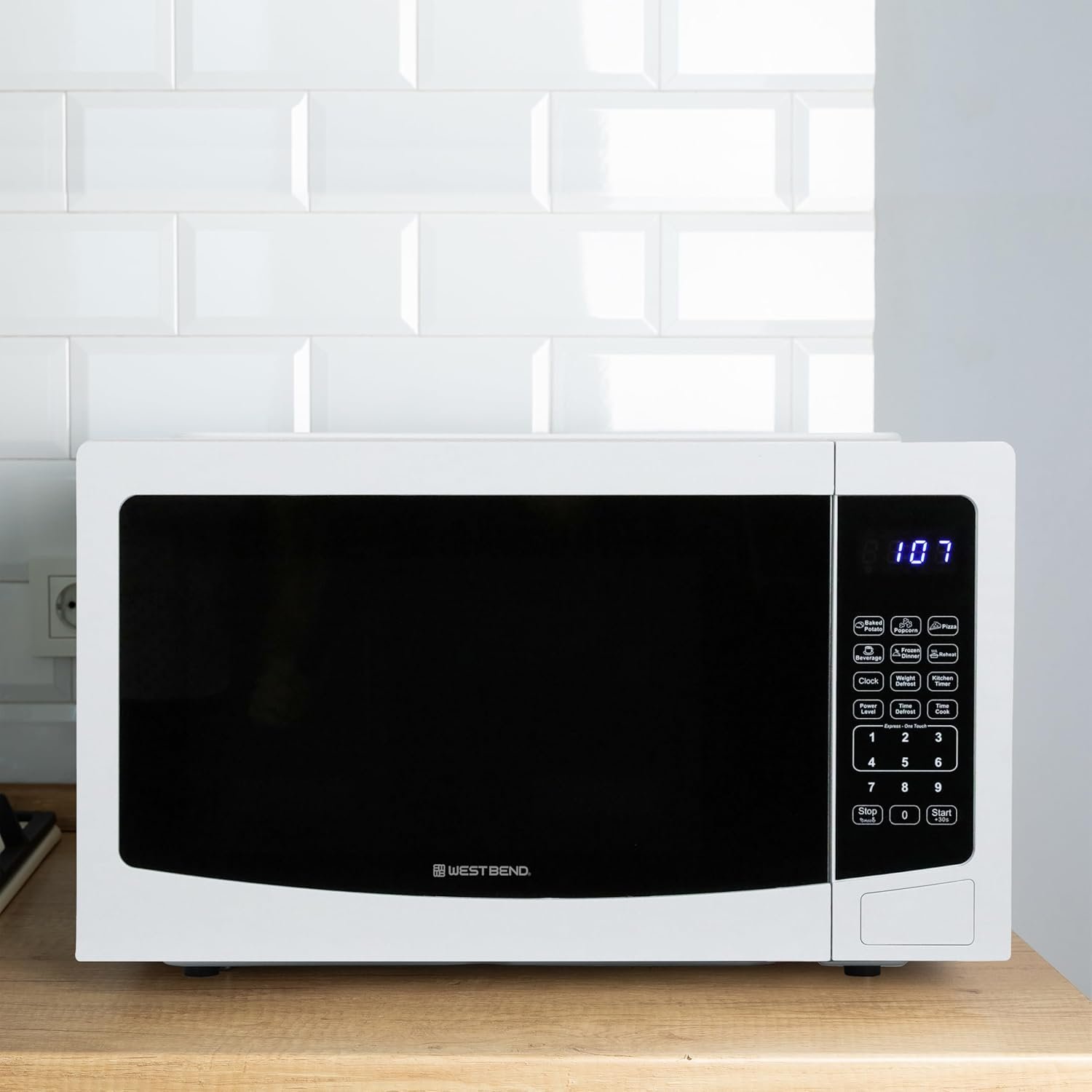 West Bend WBMW110W Microwave Oven 1000-Watts Compact with 6 Pre Cooking Settings, Time and Weight Defrost, Electronic Control Panel and Glass Turntable, White - Image 2